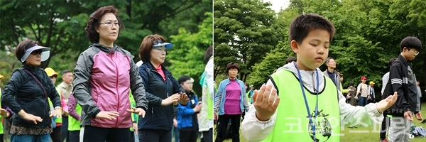 지난 20일 성남 분당중앙공원에서 열린 '경기 지구시민 숲길 명상' 행사에는 남녀노소 다 함께 자연과 하나되며 명상을 하는 시간을 가졌다. [사진=김경아 기자]