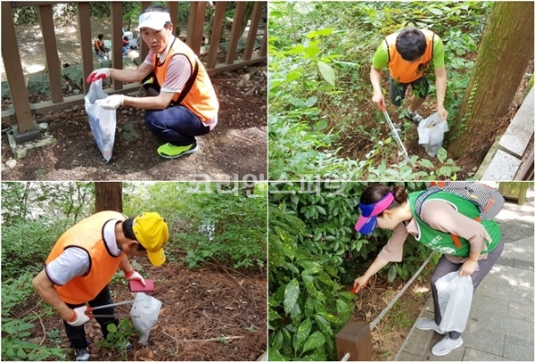 지구시민운동연합 부산 연제지회 회원들이 부산 어린이대공원에서 쓰레기를 주우며 정화활동을 하고 있다. [사진=지구시민운동연합]