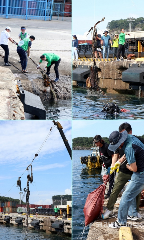 바다 속에서는 BOE 다이버들이, 지상에서는 지구시민운동연합 회원들이 협력하여 대형 해양쓰레기를 끌어올리는 모습. [사진=김경아 기자]