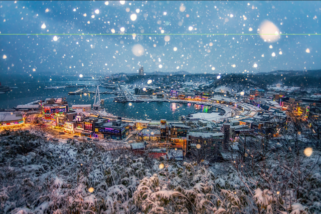 황보달 작가의 '눈꽃이 내리는 항구의 저녁'. 제7회 국가어항 디지털 사진 공모전에서 최우수상 경관부문 수상작. 사진 해양수산부.